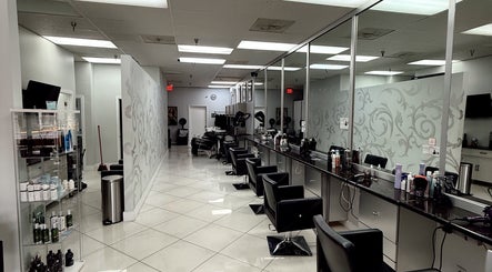 Sleek salon interior with mirrored walls at The Lotus Chair, Boca Raton, Florida, US.