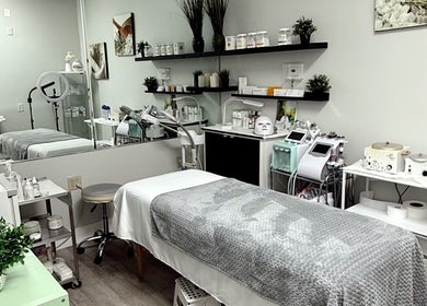 Serene treatment room at The Lotus Chair, Boca Raton, Florida, US, featuring modern wellness equipment.