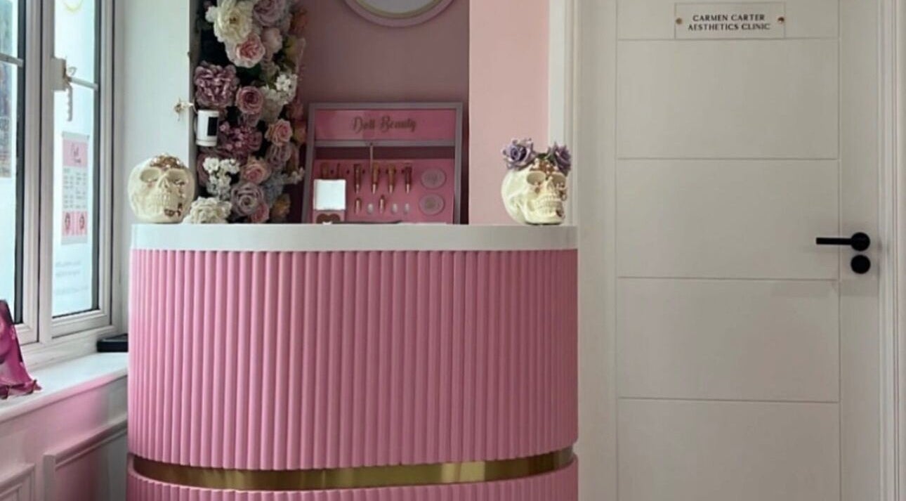 Chic pink reception at LSR Lounge, Windlesham, England, GB featuring floral decor and aesthetic displays.