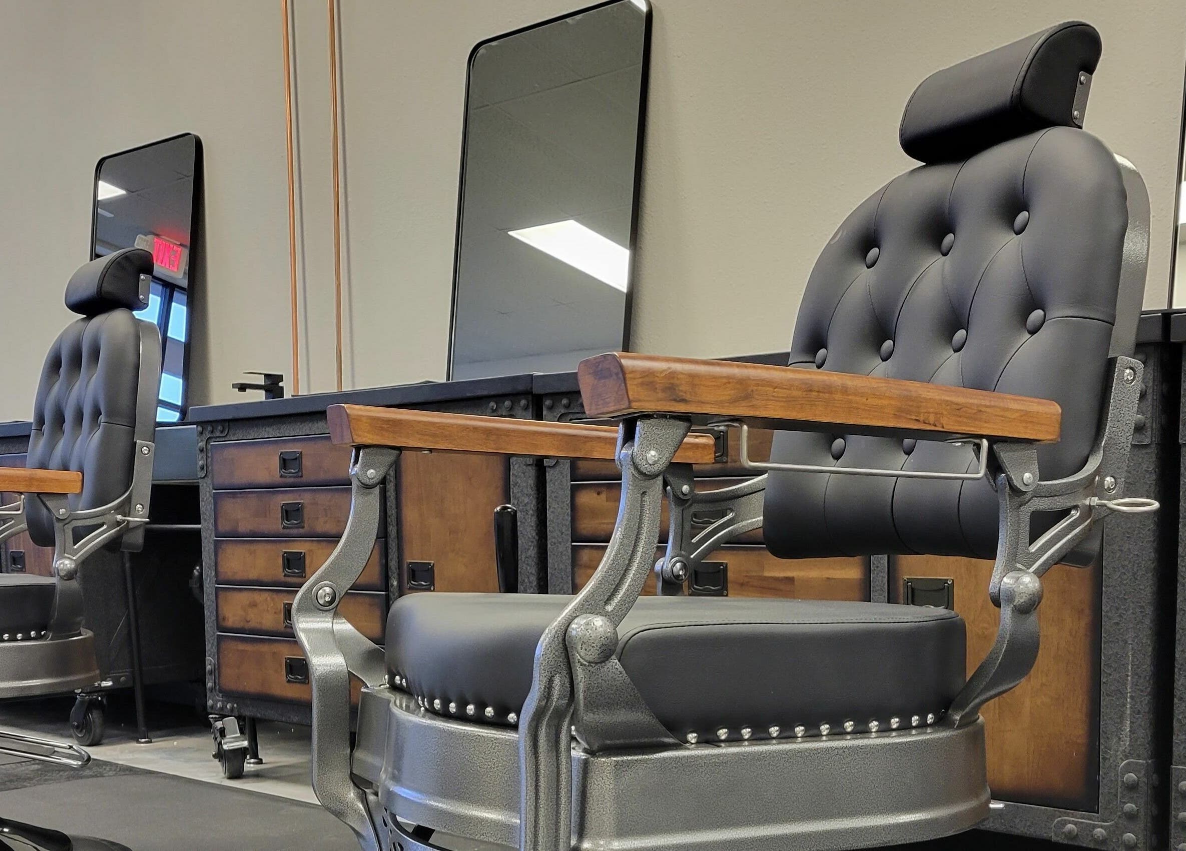 Elegant barber chairs at Executive Men's Grooming Mesa, located in Mesa, Arizona, US.