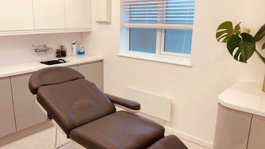 Modern treatment room at Contoured by Holly - Garlinge, Margate, England, GB with sleek bed and decor.