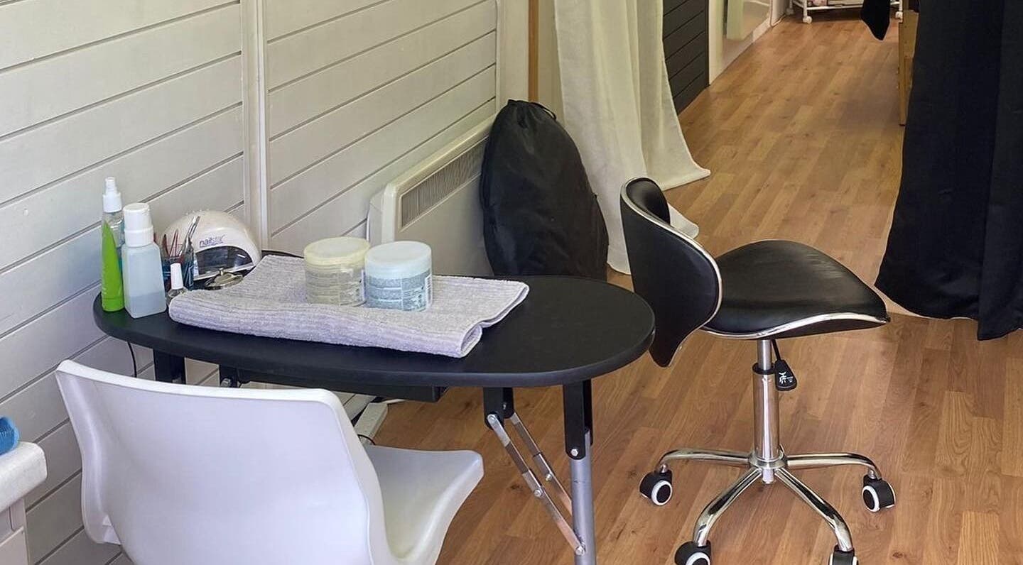 Nail treatment station at The Soul Sanctuary, Little Brickhill, England, GB, showcasing a serene work area.