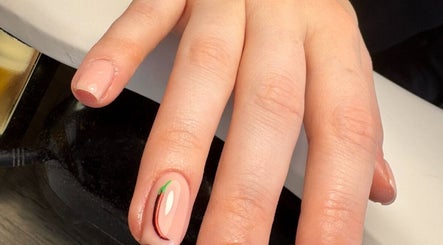 Elegant nail art with stripe detail at Create By Chloe in Bishopbriggs, Scotland, GB.