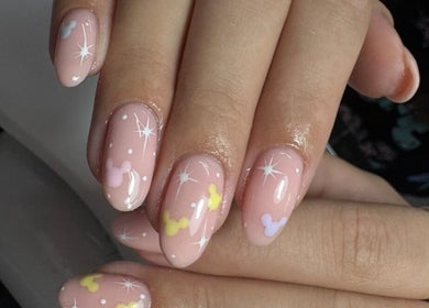 Chic pastel nail art at Create By Chloe, Bishopbriggs, Scotland, GB featuring stars and dots.