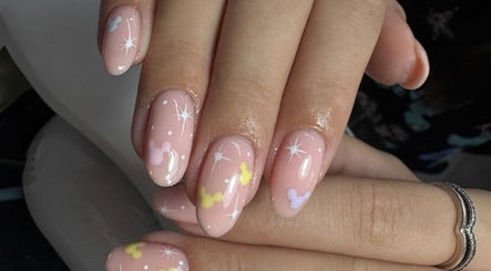 Chic pastel nail art at Create By Chloe, Bishopbriggs, Scotland, GB featuring stars and dots.