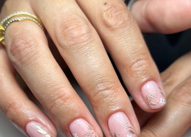 Elegant floral nail art design at Beauty in the Peak, High Peak, England, GB showcasing detailed craftsmanship.
