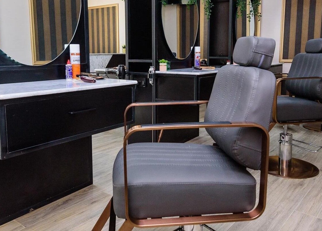 Modern salon chairs and styling stations at Groomed by Elereka Ikoyi in Lagos, Lagos, NG offer a sleek experience.