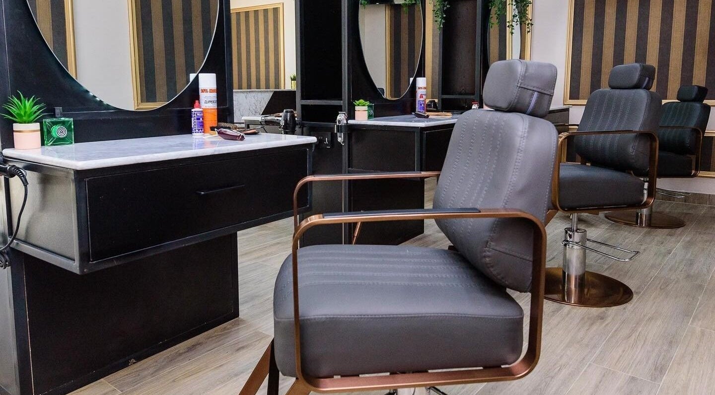 Modern salon chairs and styling stations at Groomed by Elereka Ikoyi in Lagos, Lagos, NG offer a sleek experience.