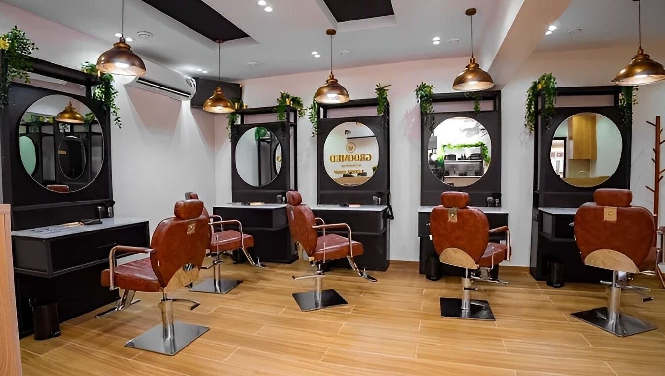 Elegant interior of Groomed By Elereka Lekki, featuring stylish salon chairs in Lekki, Lagos, NG.