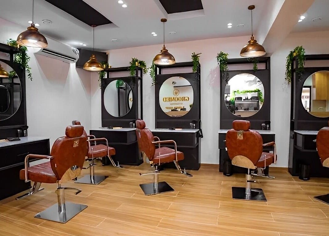 Elegant interior of Groomed By Elereka Lekki, featuring stylish salon chairs in Lekki, Lagos, NG.