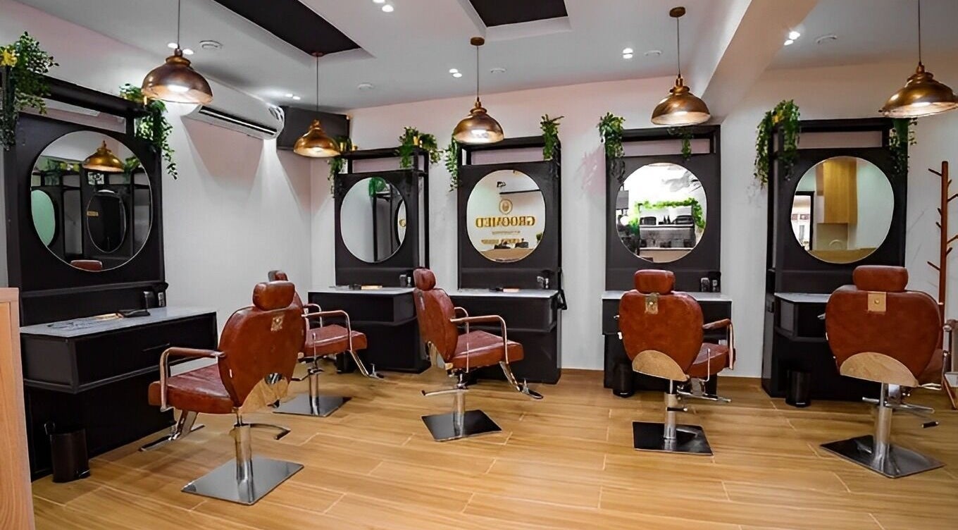 Elegant interior of Groomed By Elereka Lekki, featuring stylish salon chairs in Lekki, Lagos, NG.