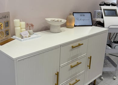 Chic reception area at Redefine Body Contouring in Poynton, Cheshire, England with modern decor.