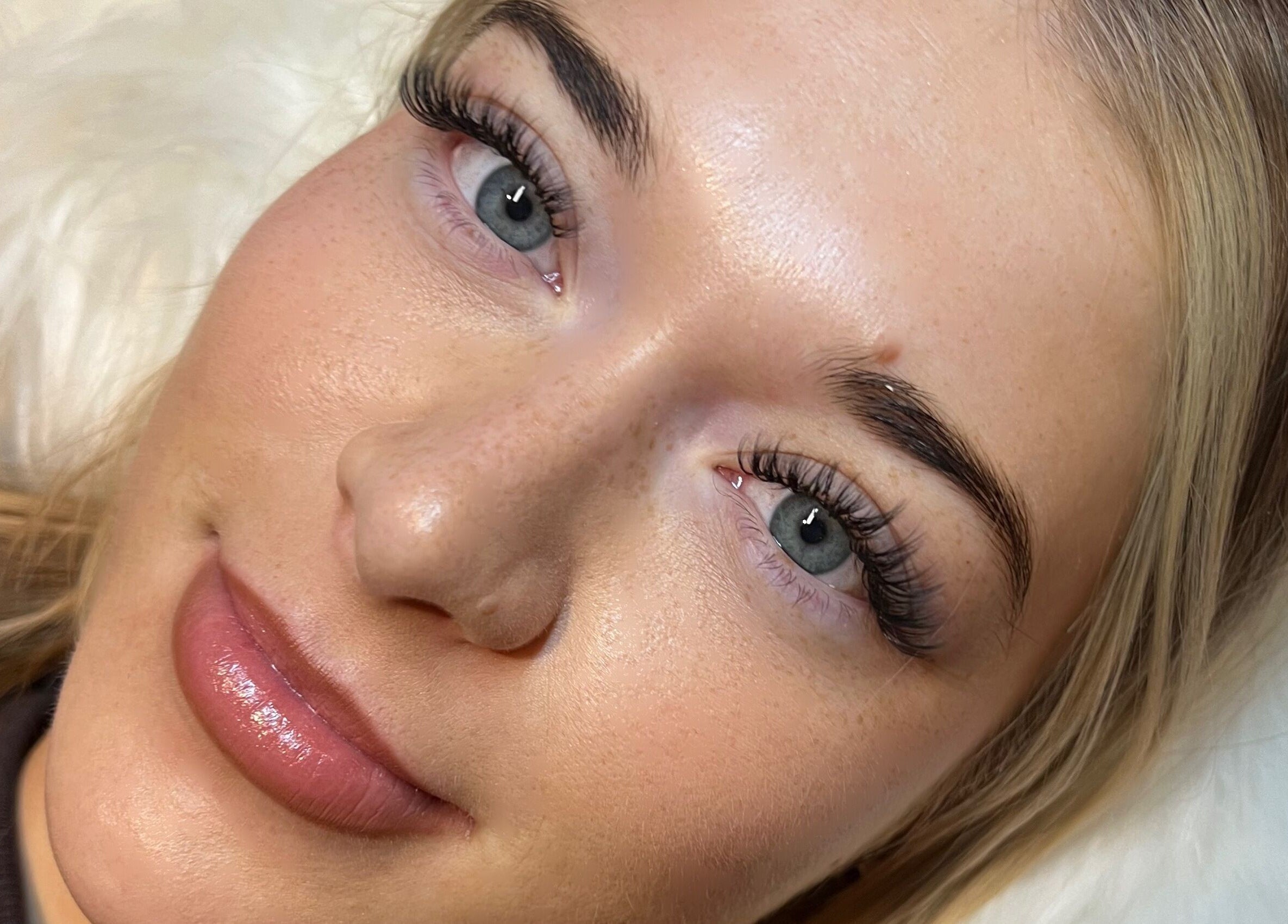 Close-up of woman's enhanced eyelashes at AZlash Reading, Reading, England, GB.