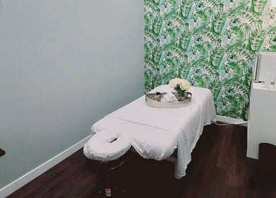 Serene massage room at Mica Spa Wellness, Vaughan, Ontario, CA with soothing decor and a comfortable table.