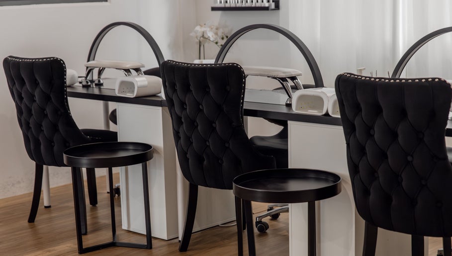 Chic nail stations at Melly's Beauty Parlour in Newstead, Queensland, AU, offering luxurious beauty services.