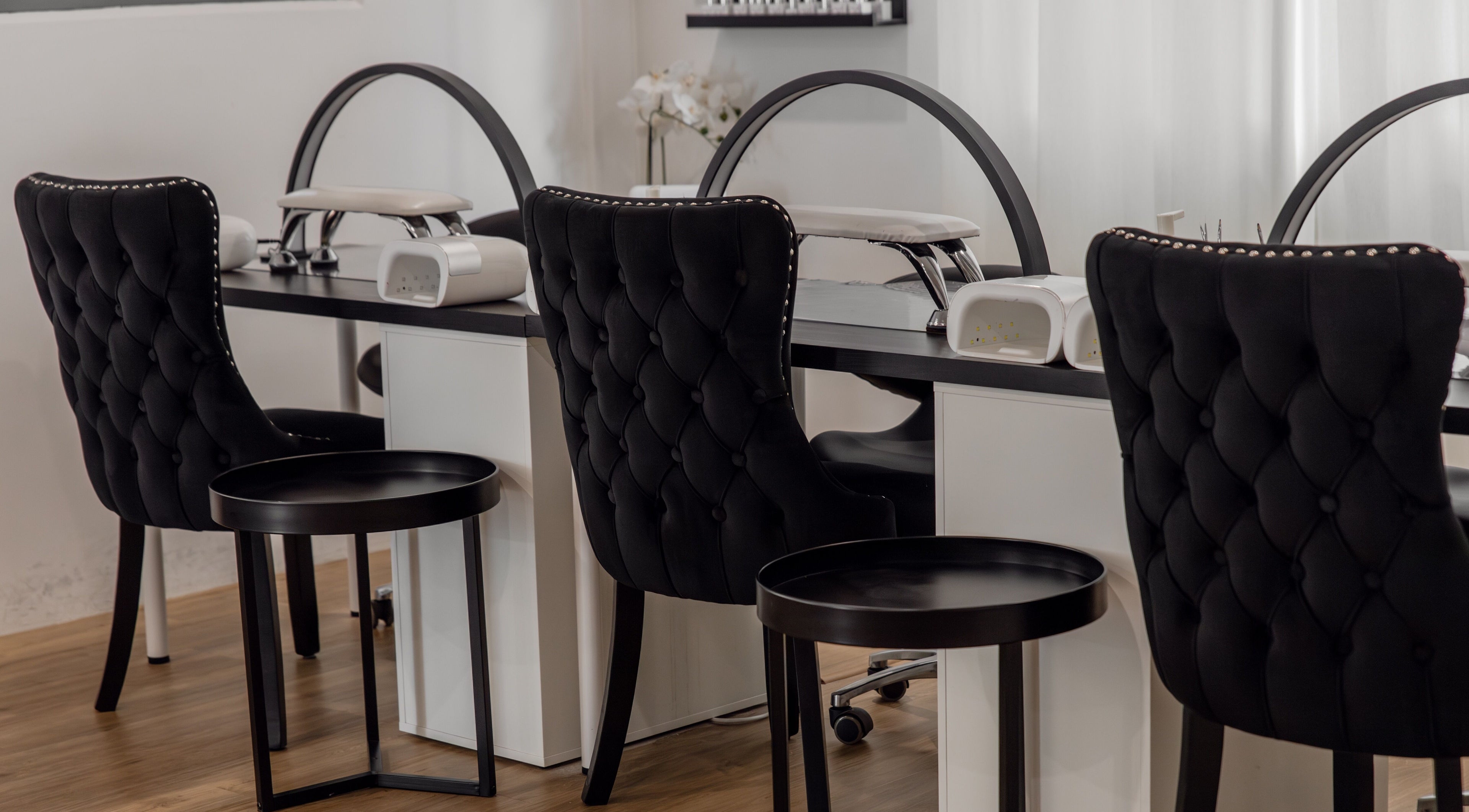 Chic nail stations at Melly's Beauty Parlour in Newstead, Queensland, AU, offering luxurious beauty services.