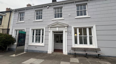 Elegant facade of Cara Does Nails, located at 79 Cowbridge, Wales, GB, highlighting a serene entryway.