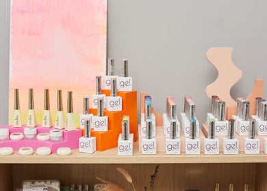 Colorful nail polish display at Cara Does Nails, Cowbridge, Wales, GB. Enhance your style with vibrant colors.