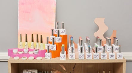 Colorful nail polish display at Cara Does Nails, Cowbridge, Wales, GB. Enhance your style with vibrant colors.