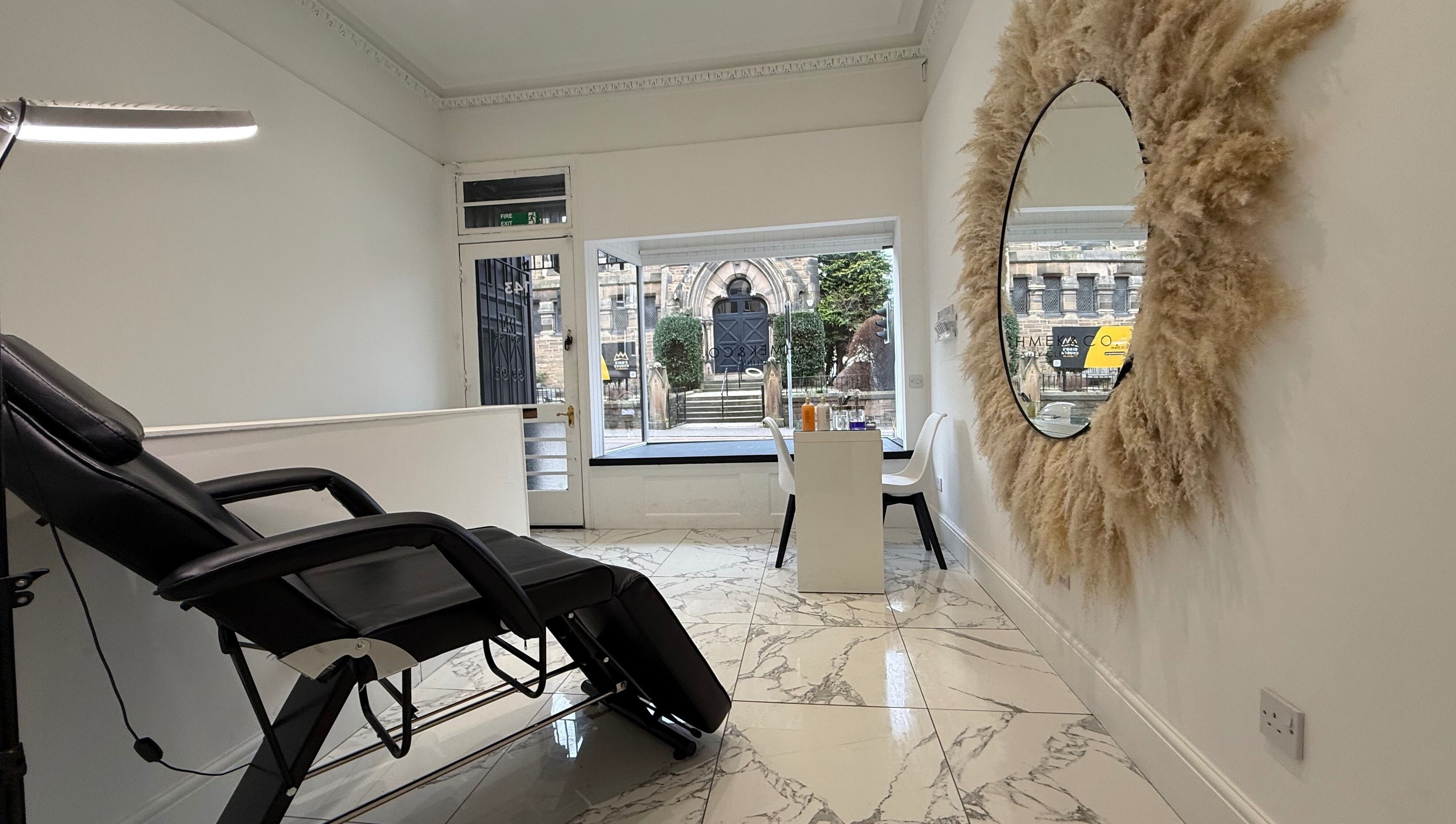 Lashmek salon interior with modern design and large windows in Edinburgh, Scotland, GB.