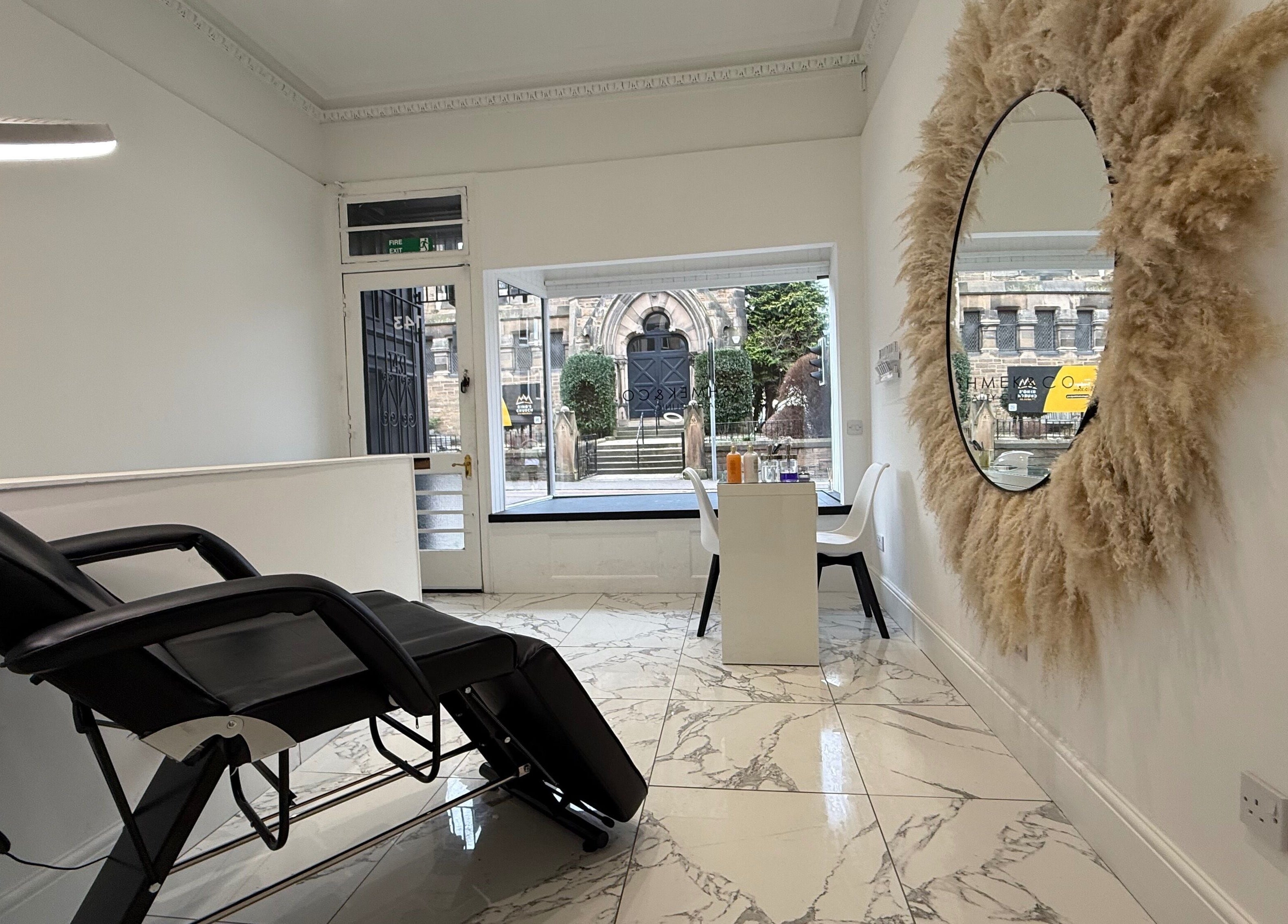 Lashmek salon interior with modern design and large windows in Edinburgh, Scotland, GB.