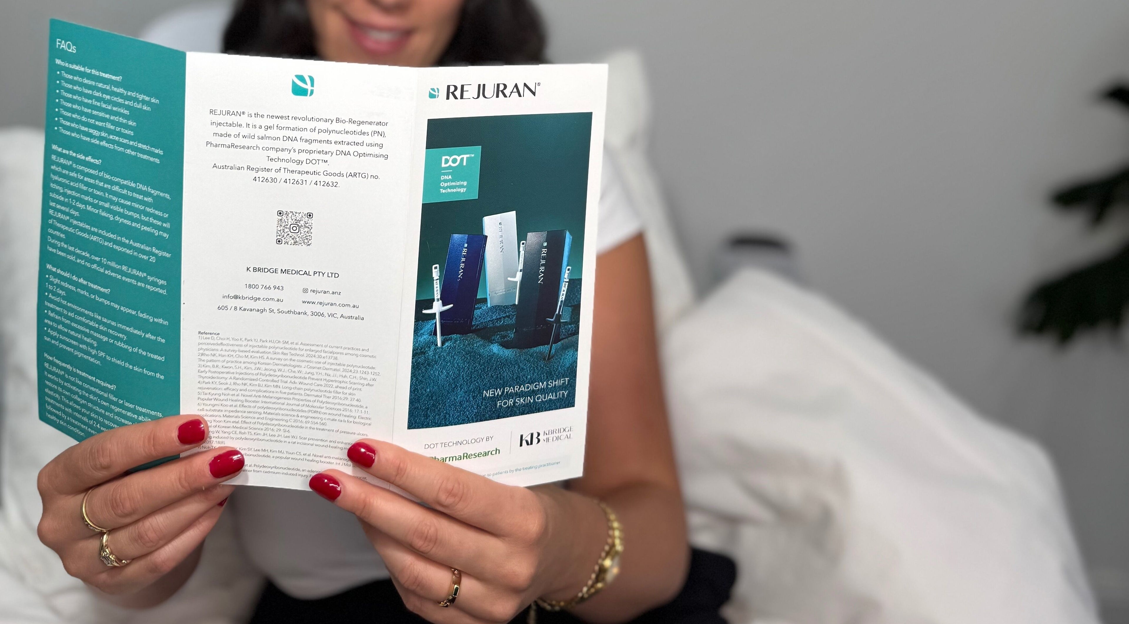 Person reads Rejuran pamphlet at Aesthetixx, Coburg North, Victoria, AU, highlighting skin quality innovations.