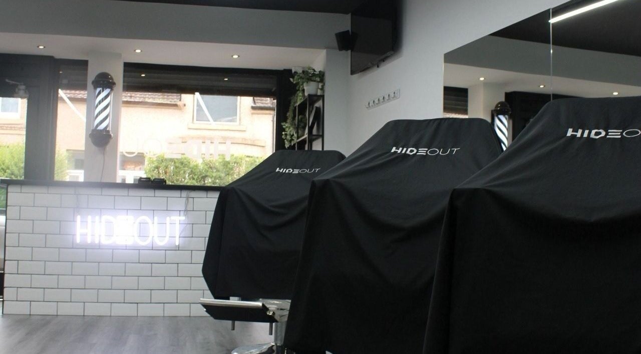 Interior of Hideout, a stylish beauty venue in Glasgow, Scotland, GB with modern chairs and sleek design.