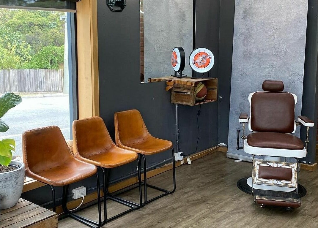 Eastside salon seating with vintage barber chair in Camberwell, VIC, AU near sunny window and greenery.