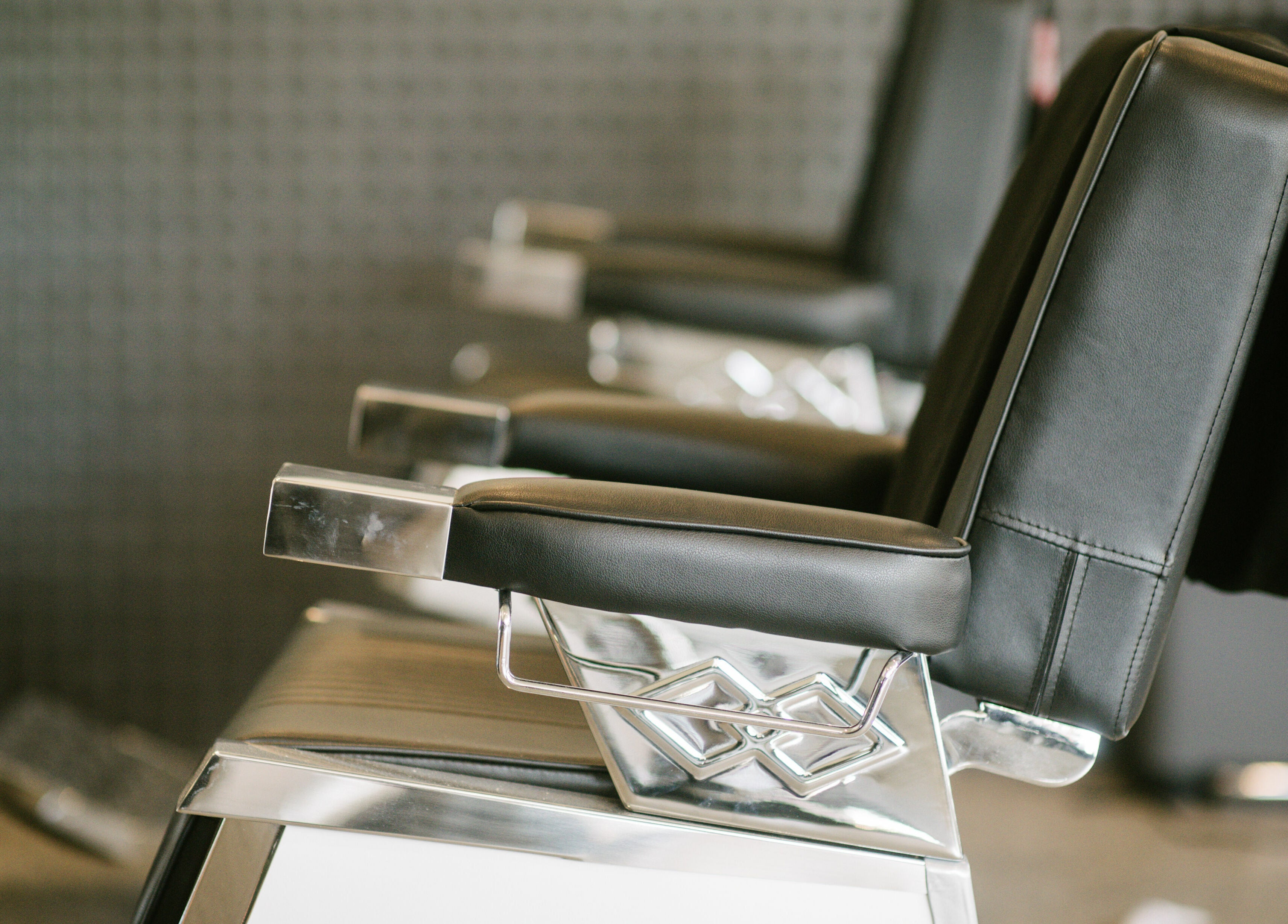 Elegant styling chairs at Eastside, Camberwell, VIC, AU, offering a luxurious salon experience.