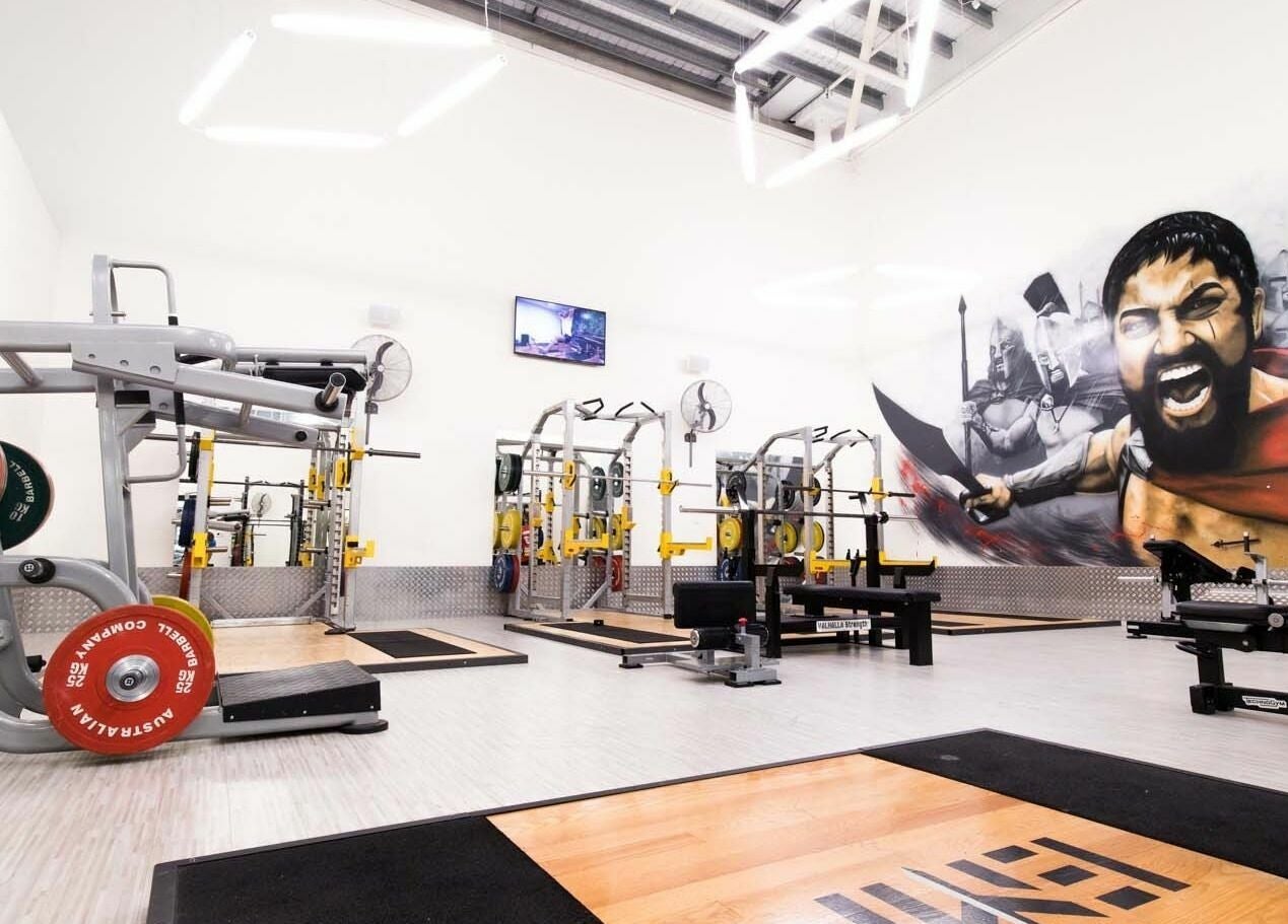 EMF Performance Centre | Coomera gym with modern equipment in Upper Coomera, Queensland, AU boasting a Spartan mural.