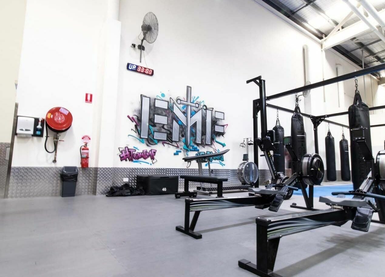 EMF Performance Centre Coomera's sleek interior with edgy graffiti, located in Upper Coomera, Queensland, AU.