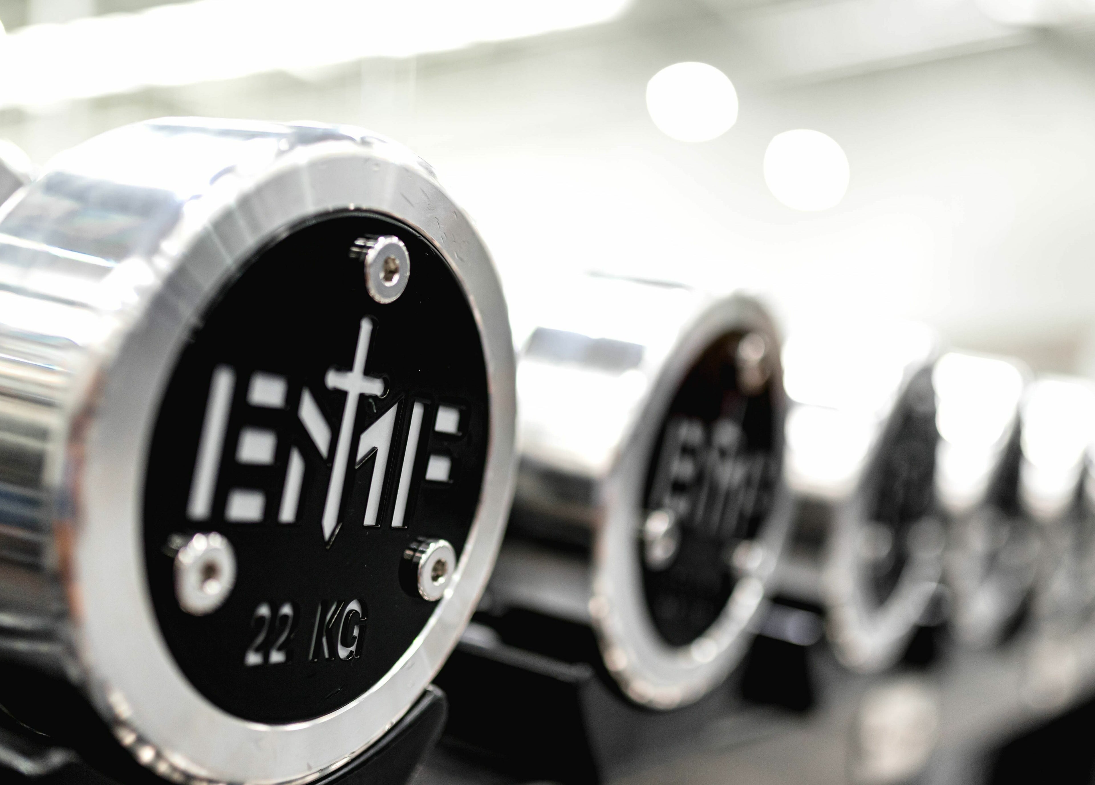 Close-up of shiny dumbbells at EMF Performance and Recovery Centre | Springfield, Queensland, AU.