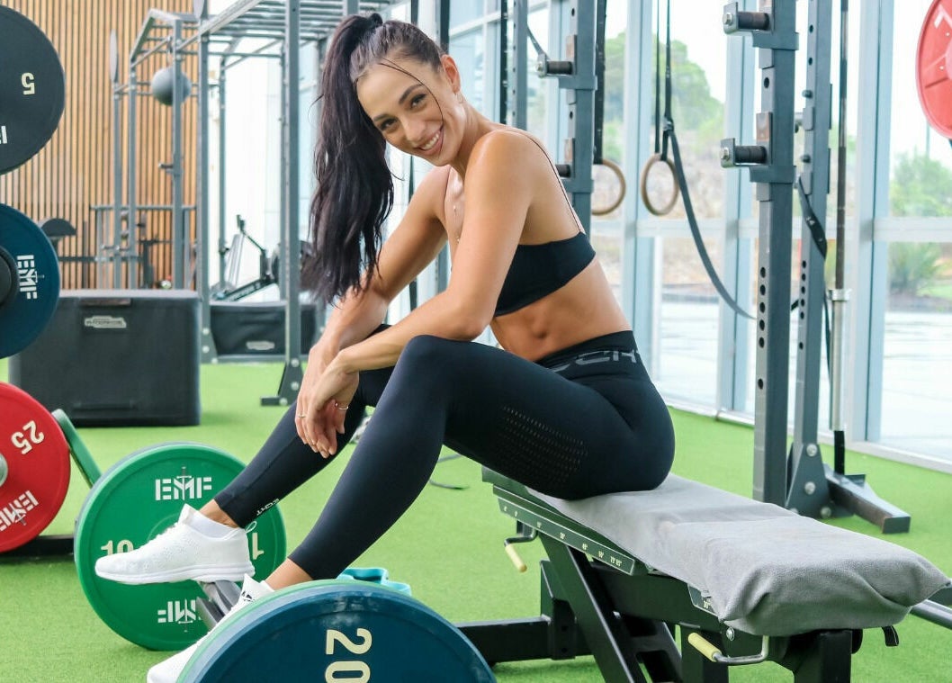 Woman exercising at EMF Performance and Recovery Centre | Springfield in Springfield Central, Queensland, AU.