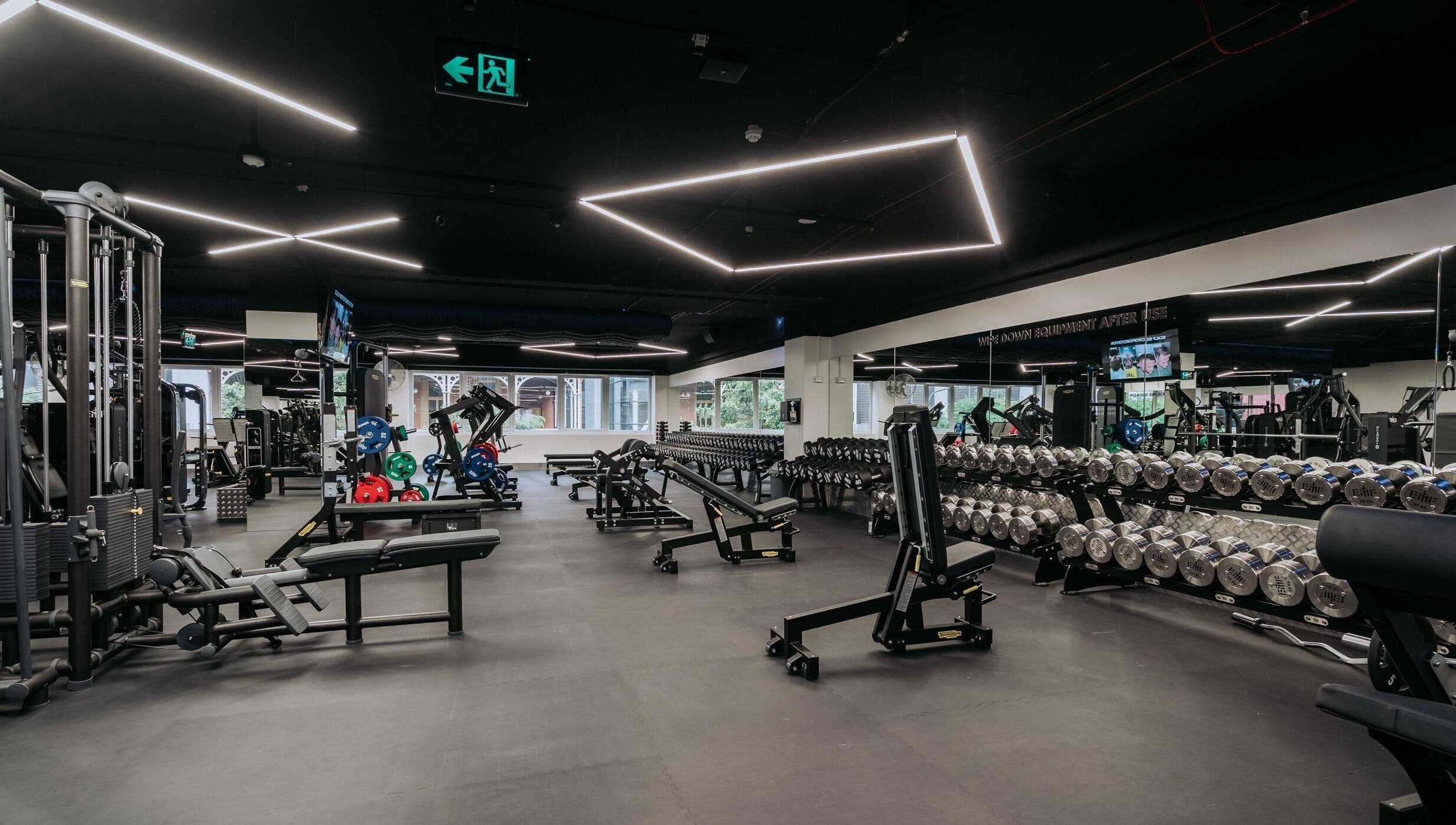 State-of-the-art gym at EMF Yarrabilba, Yarrabilba, Queensland, AU with advanced equipment and sleek design.
