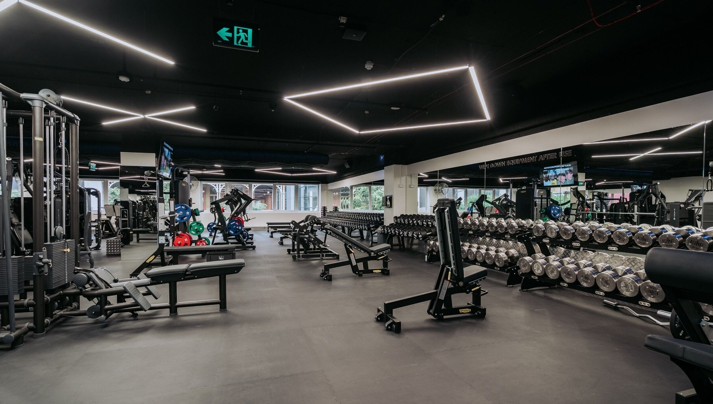 State-of-the-art gym at EMF Yarrabilba, Yarrabilba, Queensland, AU with advanced equipment and sleek design.