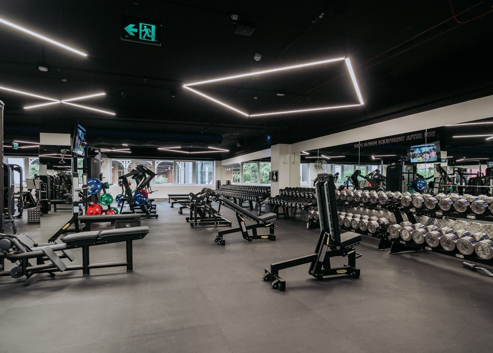 State-of-the-art gym at EMF Yarrabilba, Yarrabilba, Queensland, AU with advanced equipment and sleek design.