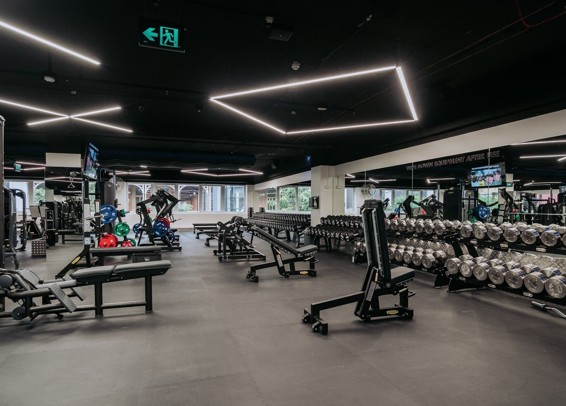 State-of-the-art gym at EMF Yarrabilba, Yarrabilba, Queensland, AU with advanced equipment and sleek design.