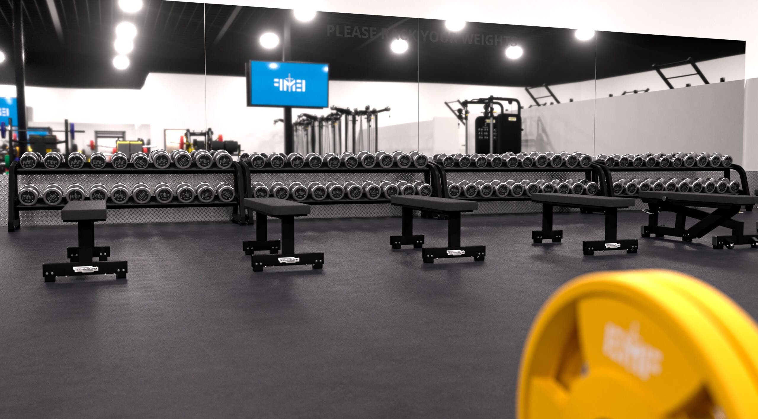 Spacious gym with weights and benches at EMF Yarrabilba, Yarrabilba, Queensland, AU.