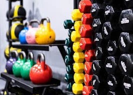Bright kettlebells and dumbbells at EMF Performance and Recovery Centre | Nerang in Highland Park, Queensland, AU.