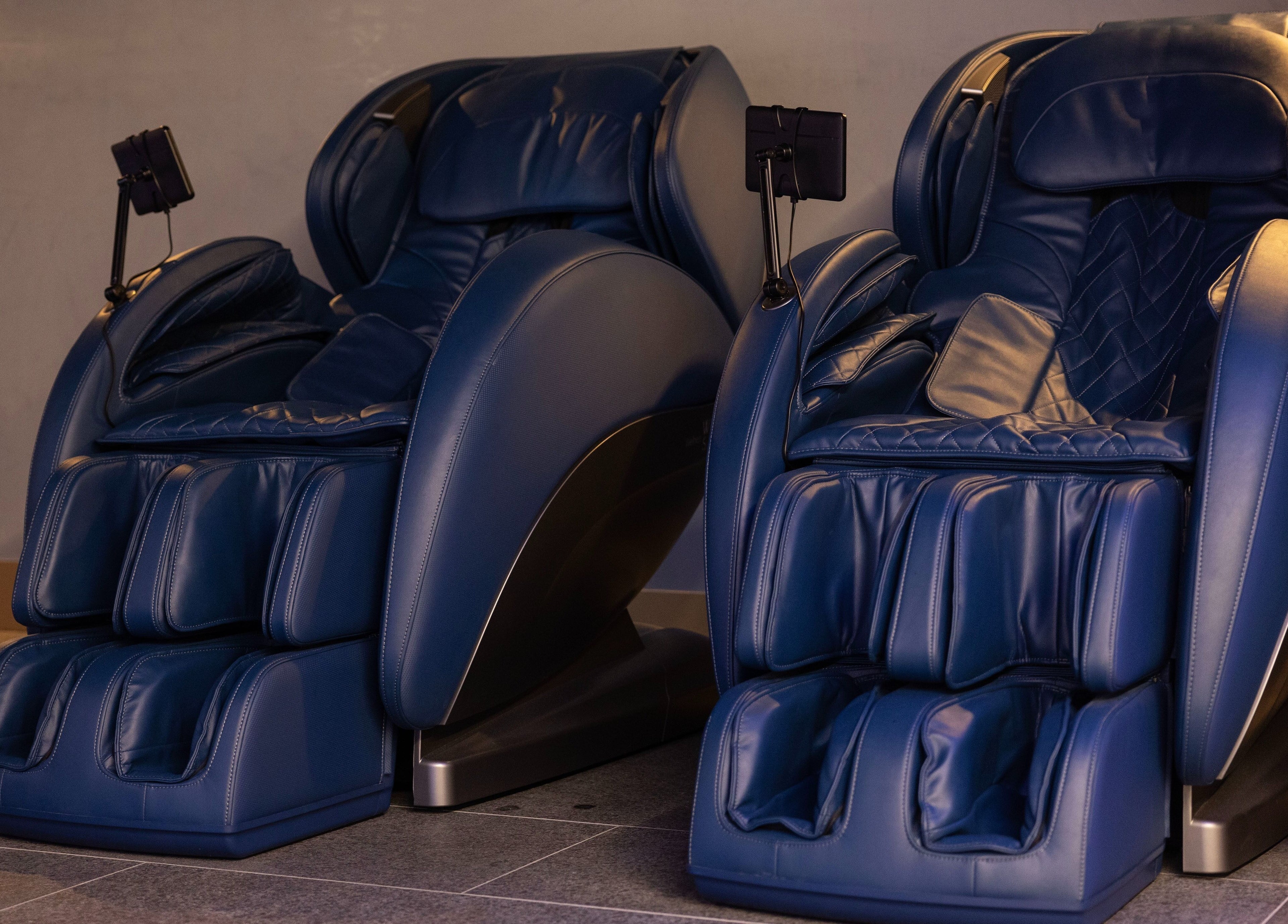 Relaxing massage chairs at EMF Health Club | Circular Quay, Sydney, New South Wales, AU offers superior comfort.