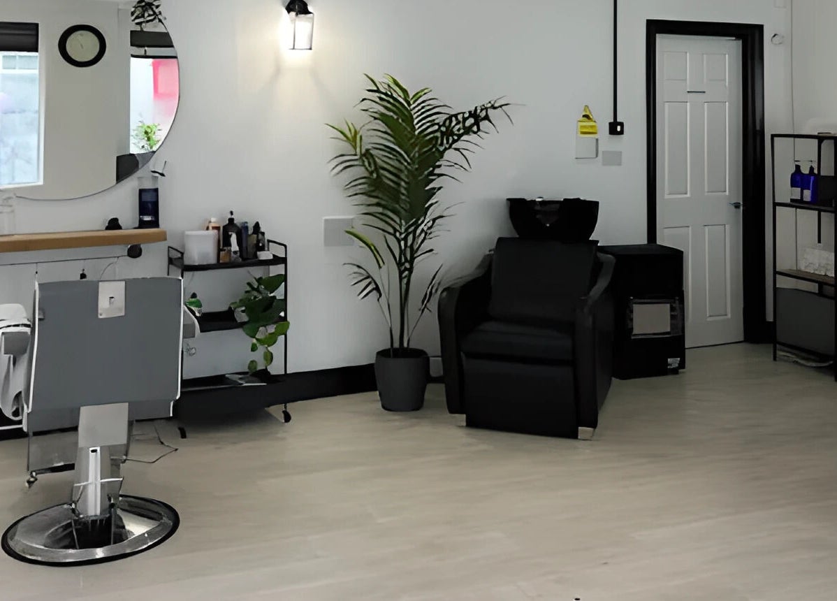 Modern interior of Nobleman's Barbershop Newbridge, County Kildare, IE showcasing sleek decor and comfortable seating.