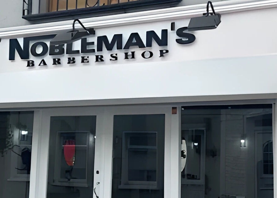 Front view of Nobleman's Barbershop, Newbridge, County Kildare, IE showcasing sleek signage.
