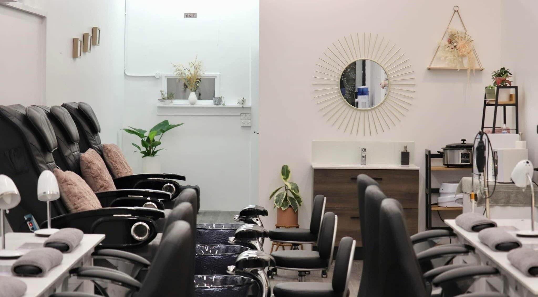 Modern interior of Daisy Nail Spa Timaru in Timaru, Canterbury, NZ with stylish seating and decor.