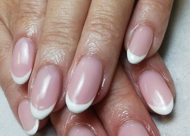 Beautiful French manicure at The Nail Lady, Londonderry, Northern Ireland, GB. Perfect for elegance.