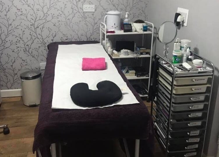 Relaxing treatment room at Jodie's Beauty & Aesthetics Lounge in Lancaster, England, GB, with massage table.