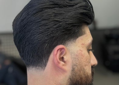 Close-up of a sleek fade haircut at Blades Barbers, Hereford, England, GB.
