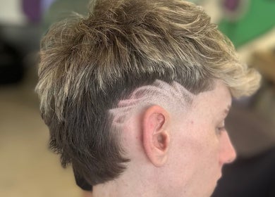 Precision haircut detail at Blades Barbers, Hereford, England, GB, showcasing expert styling.