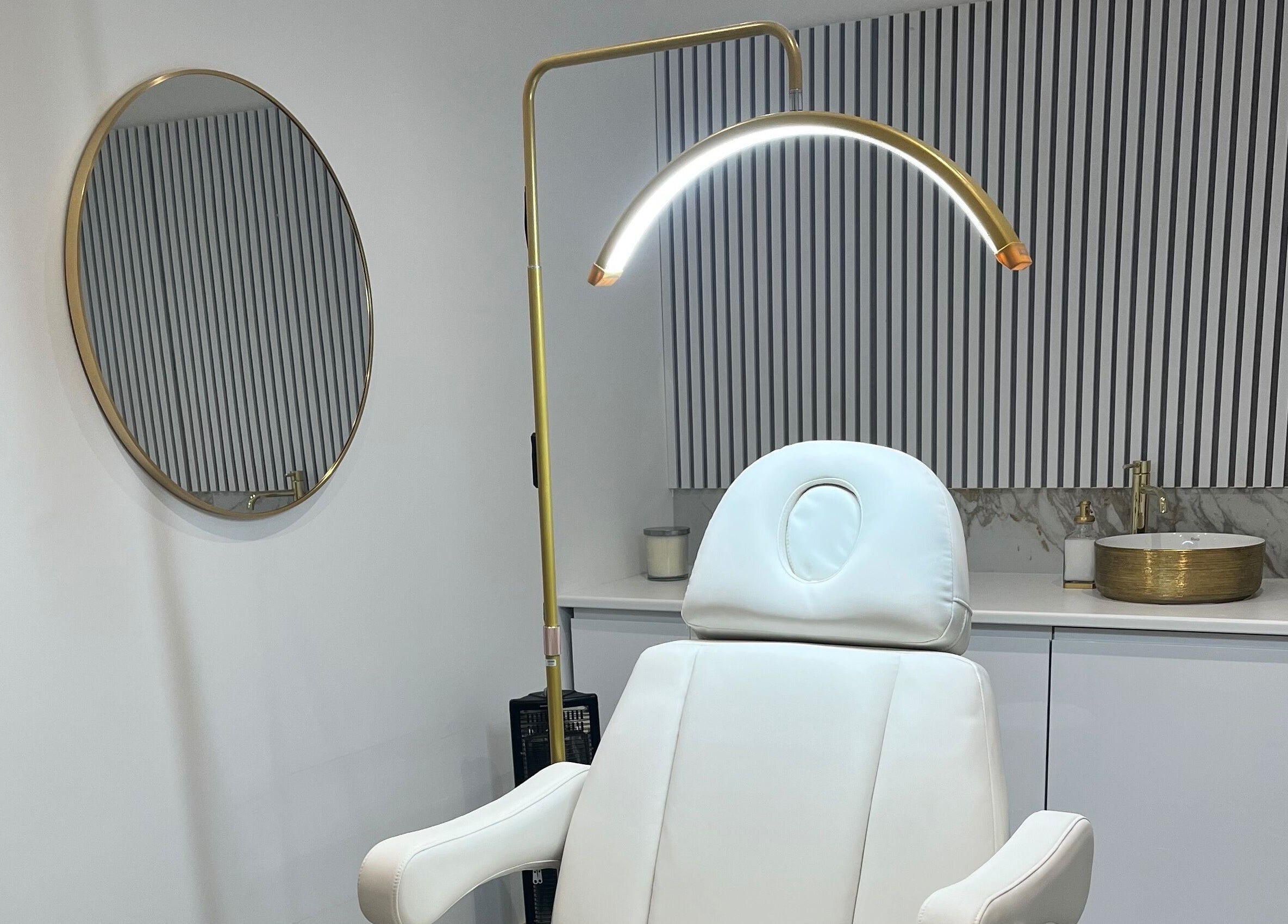 Modern treatment room at Renaissance Aesthetics, Sligo, County Sligo, IE with stylish decor and comfortable chair.