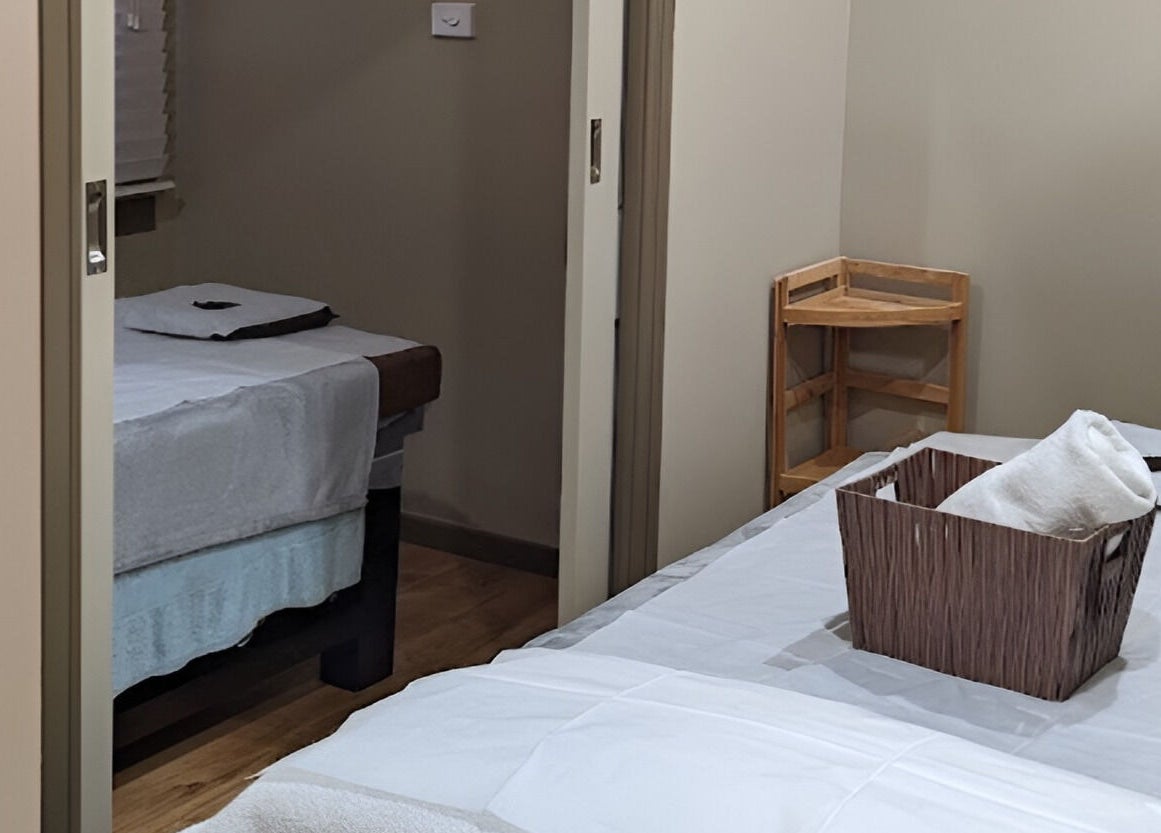 Cozy treatment rooms at Serenity Cammeray Lux Spa, Cammeray, New South Wales, AU with plush beds and calming decor.