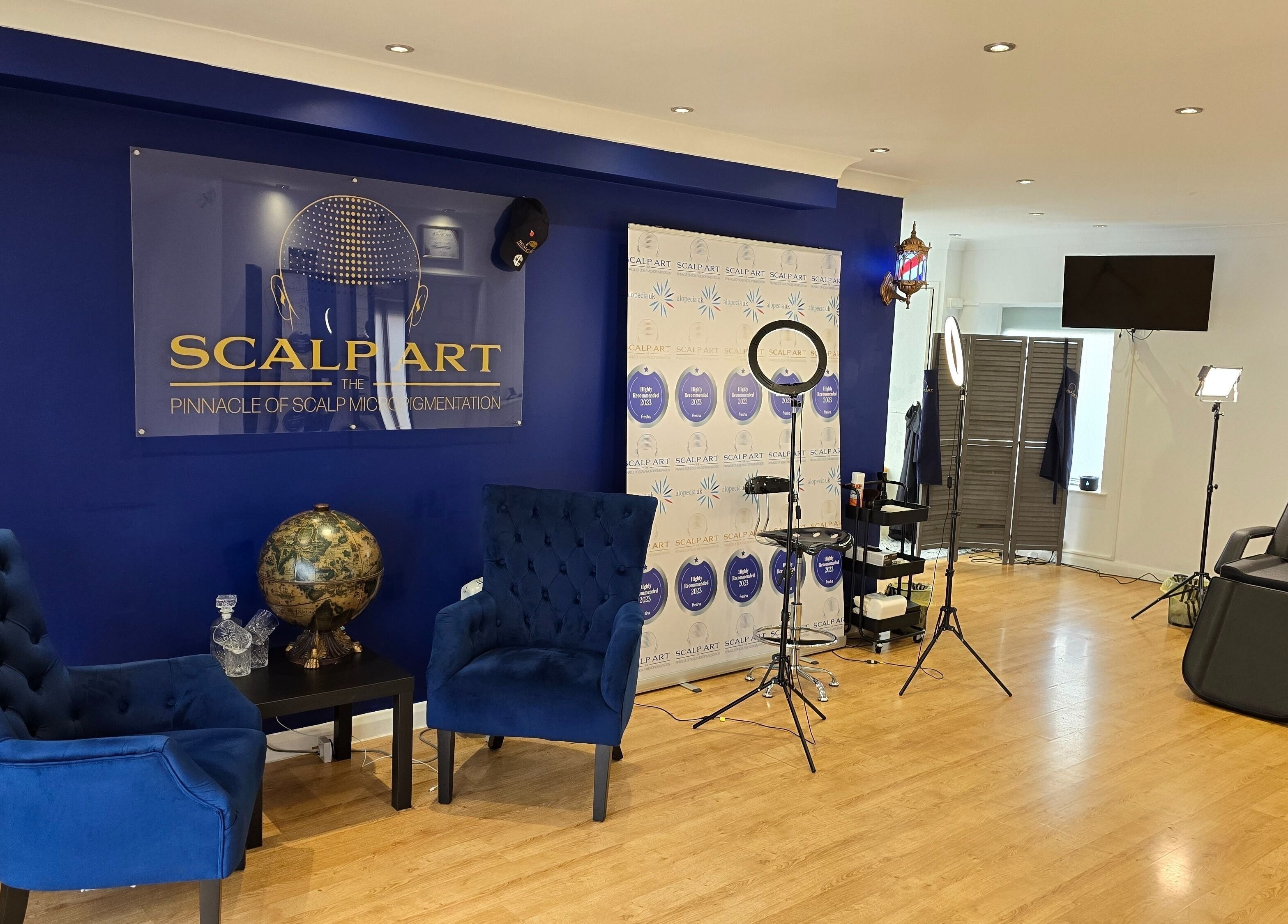 Scalp Art Clinic interior in South Woodham Ferrers, England, with blue chairs and modern lighting.
